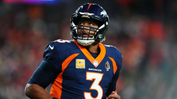 Nov 19, 2023; Denver, Colorado, USA; Denver Broncos quarterback Russell Wilson (3) in the first quarter against the Minnesota Vikings at Empower Field at Mile High.